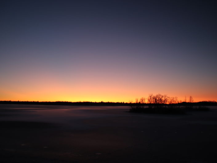 coucher soleil multicolore lac suède
